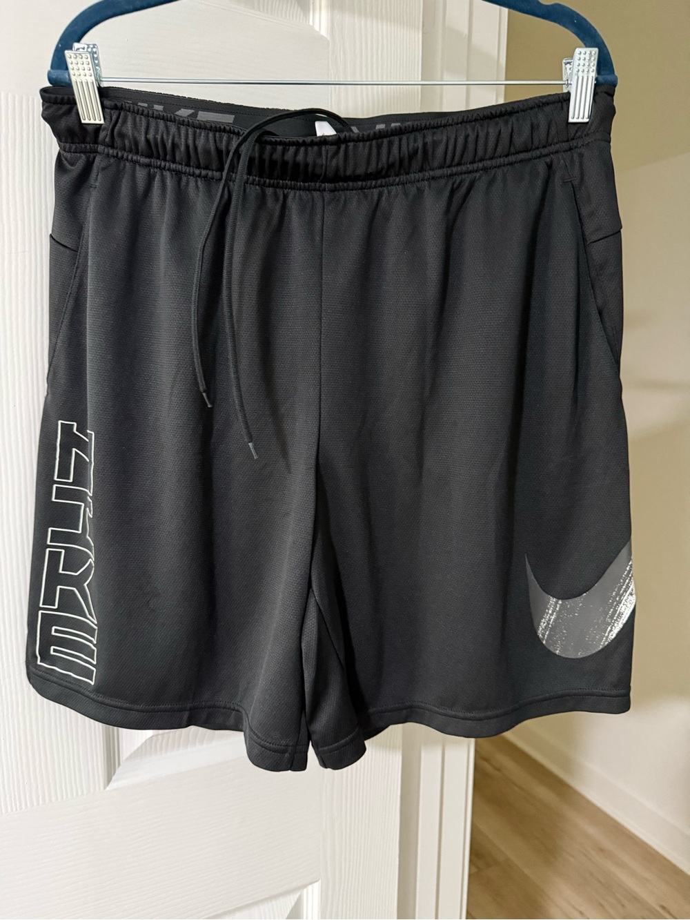 Nike Black Shorts with Silver Swoosh and White STRIVE Print